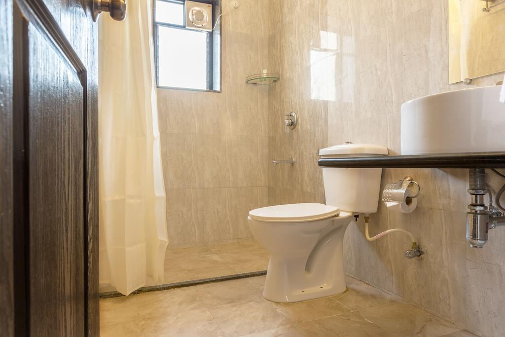 Treebo Trend Zeebo Suites Arpora Exterior photo